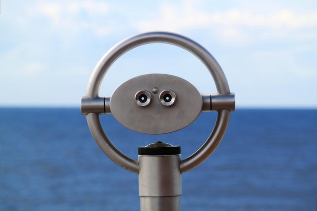 binoculars aligned with sea horizon