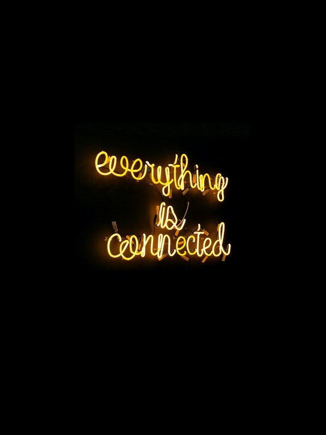 The text "Everything is Connected" in yellow on a black background