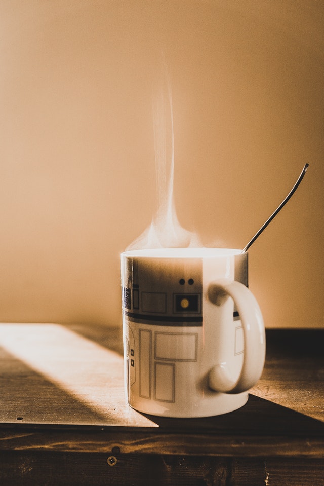 steaming mug decorated with circuits