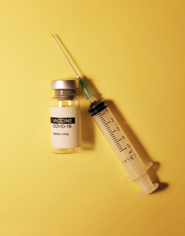 Syringe and Bottle Labelled "COVID19 Vaccine"